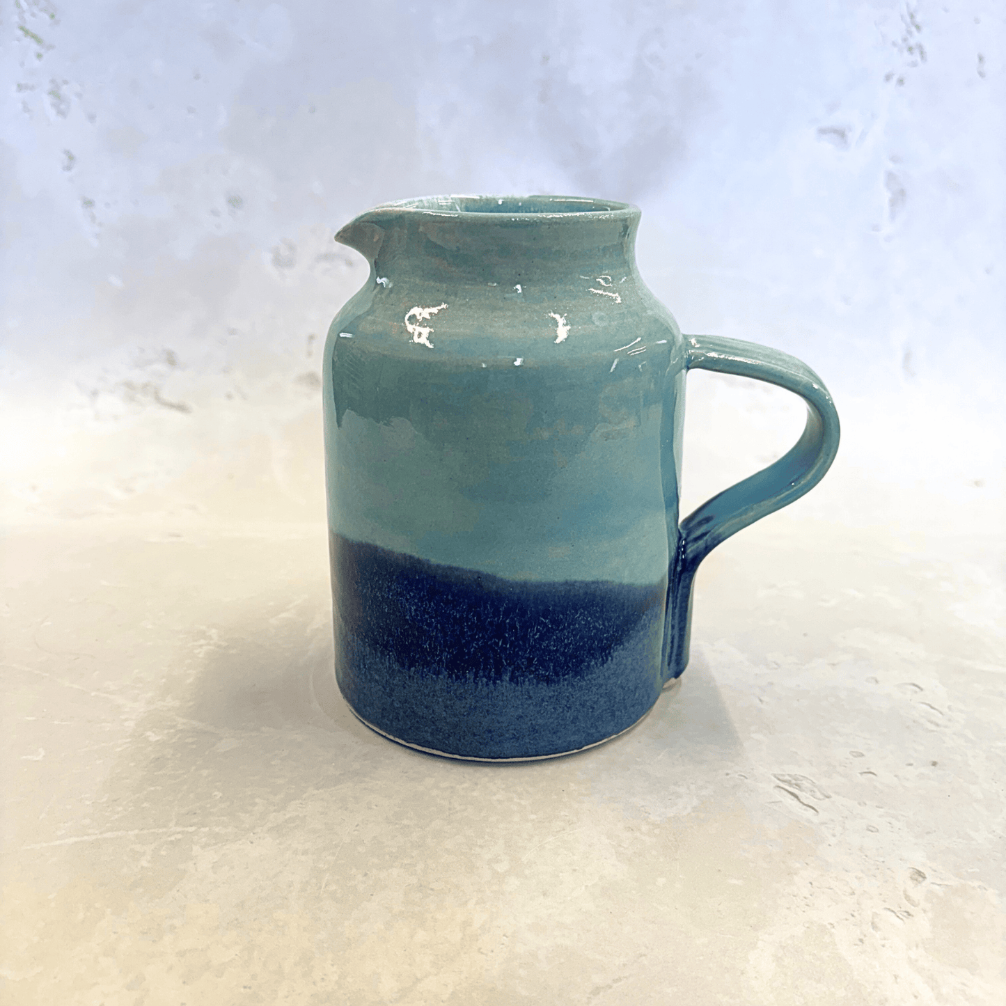 Ella Fletcher Designs Handmade UK Ceramic Jug in Blue Landscape, jug with layers of light and dark blues