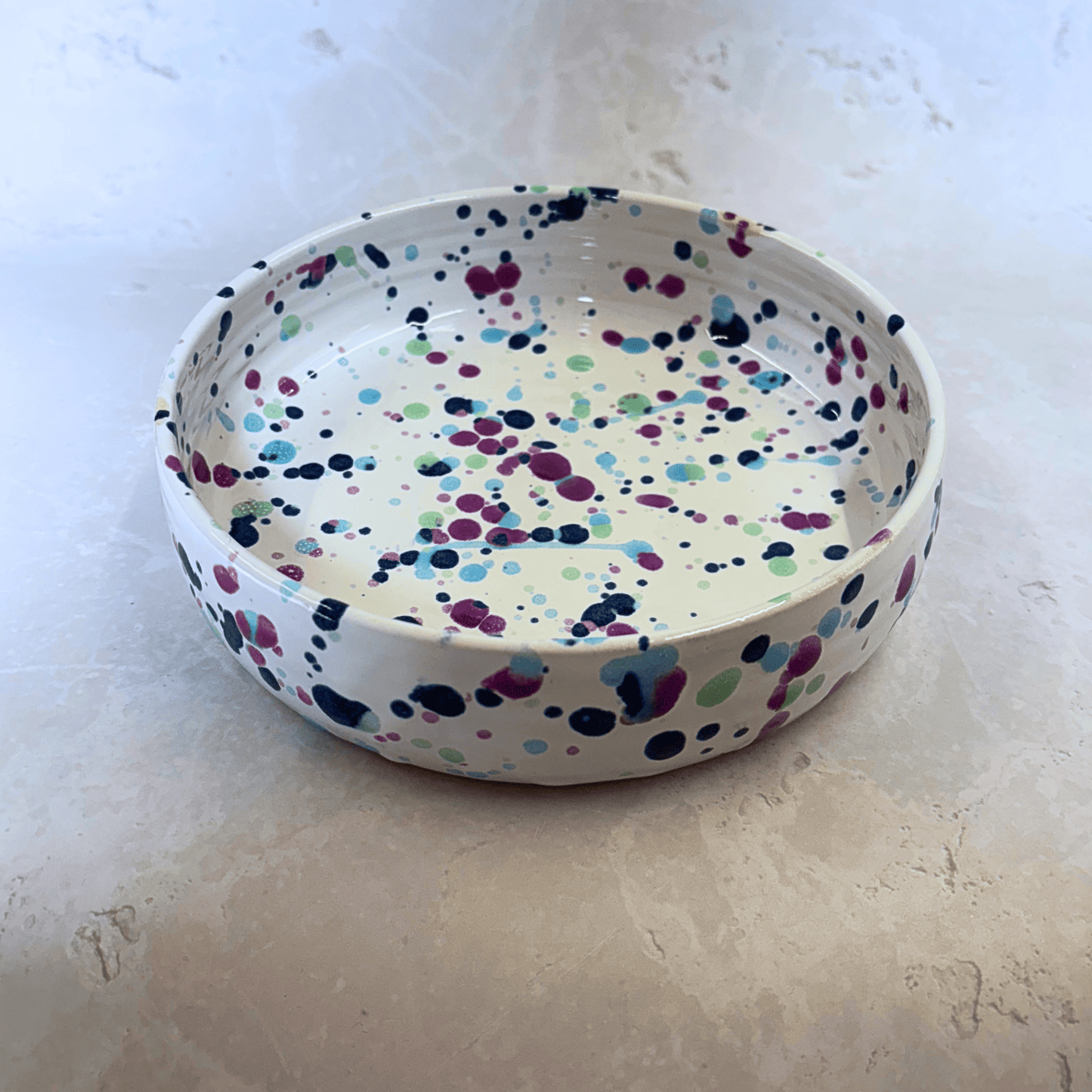 Ella Fletcher Designs Handmade Ceramic Pasta Bowls in Sweetpea design, white background with splattered green, pink and blues