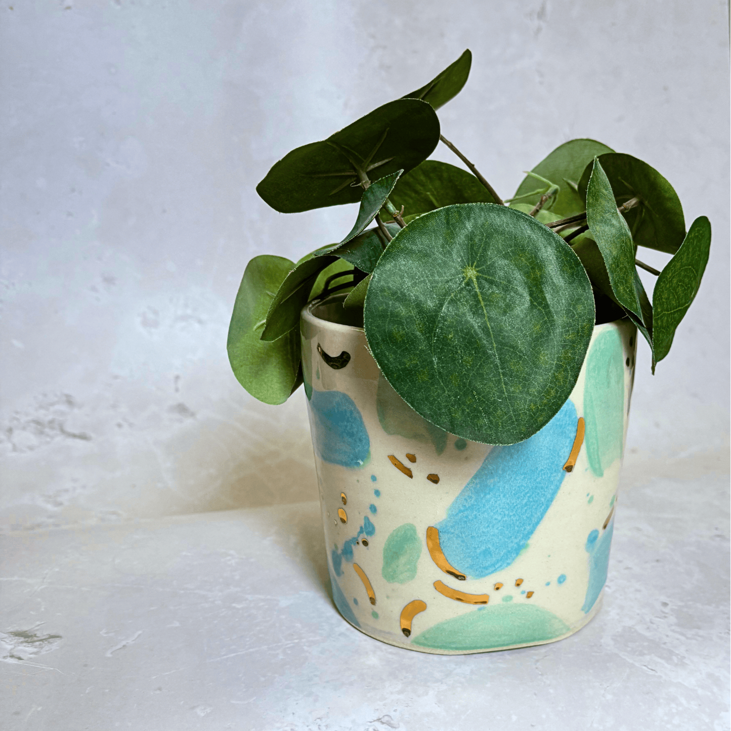 Ella Fletcher Designs Handmade Ceramic Pot in Blue & Green Sea Glass design, plant pot featuring a plate with a blue and green spot design with flecks of gold