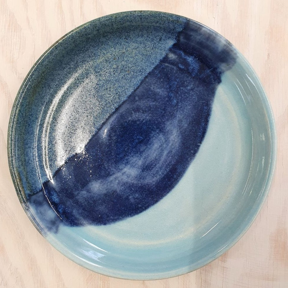 Ella Fletcher Designs Handmade Ceramic Trinket Dish in Blue Scottish Landscape, round blue dish with layers of dark and light blue