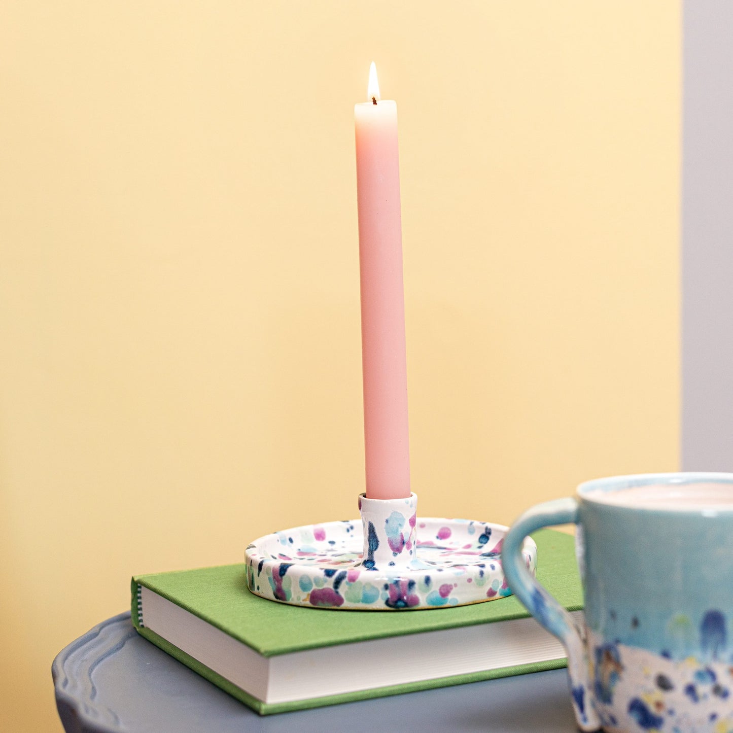 Ella Fletcher Designs Handmade Ceramic Candle Holder in Sweetpea design, featured with a pink candle