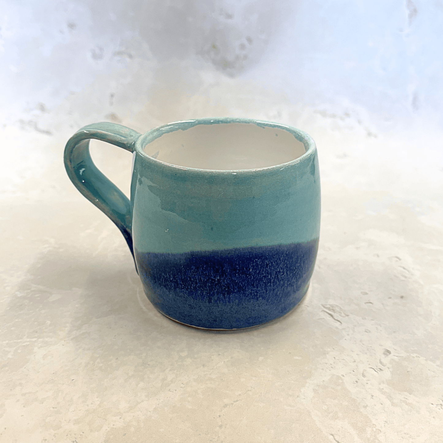 Ella Fletcher Designs Handmade Ceramic Large Round Mug in Blue Landscape, large mug in layers of light and dark blues