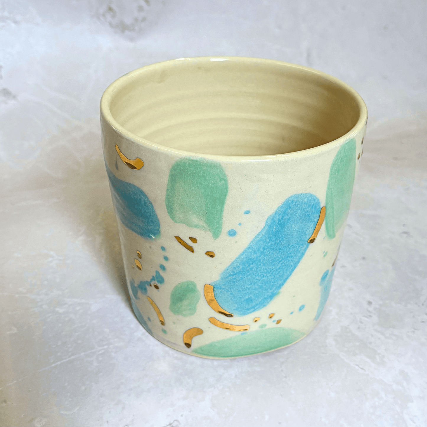 Ella Fletcher Designs Handmade Ceramic Pot in Blue & Green Sea Glass design, plant pot featuring a plate with a blue and green spot design with flecks of gold