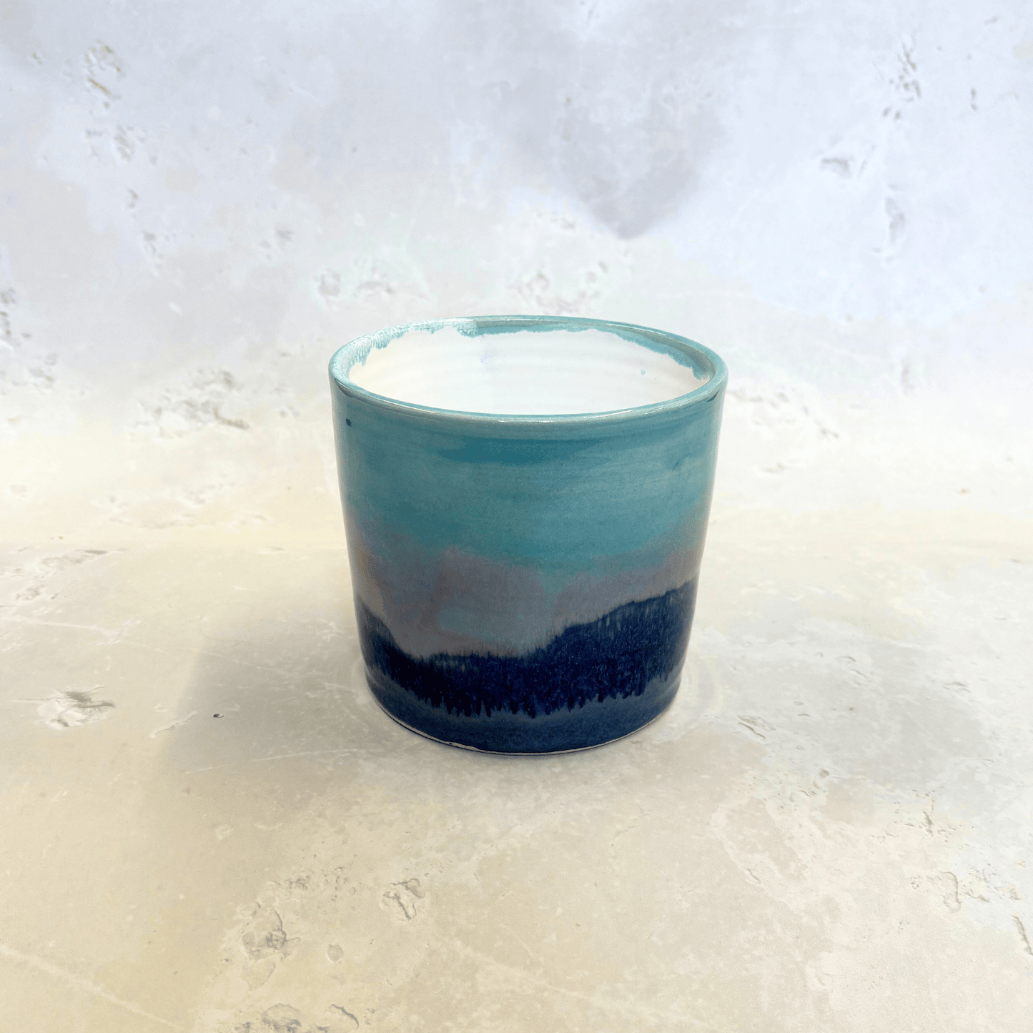 Ella Fletcher Designs Handmade Ceramics Pot in Scottish Sunrise Landscape, plant pot with layers of blues and pinks