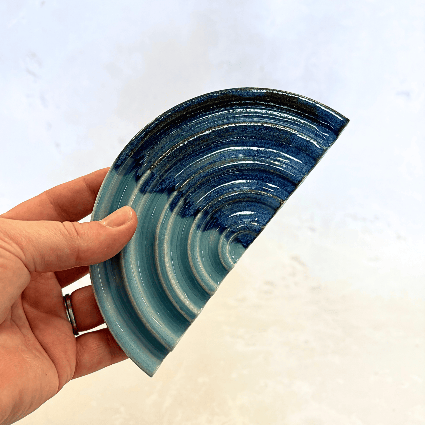 Ella Fletcher Designs Handmade Ceramics Soap Dish in Blue Landscape design, semi-circle dish with ridges and layers of blues