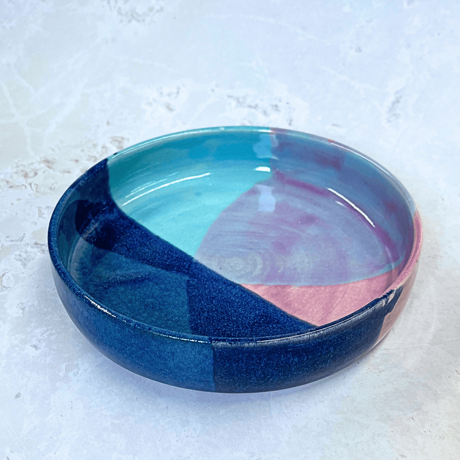 Ella Fletcher Designs Handmade Pottery Pasta Bowl in Scottish Sunrise Landscape Design - ceramic pasta bowl with layers of blues and pinks resembling a Scottish sunrise