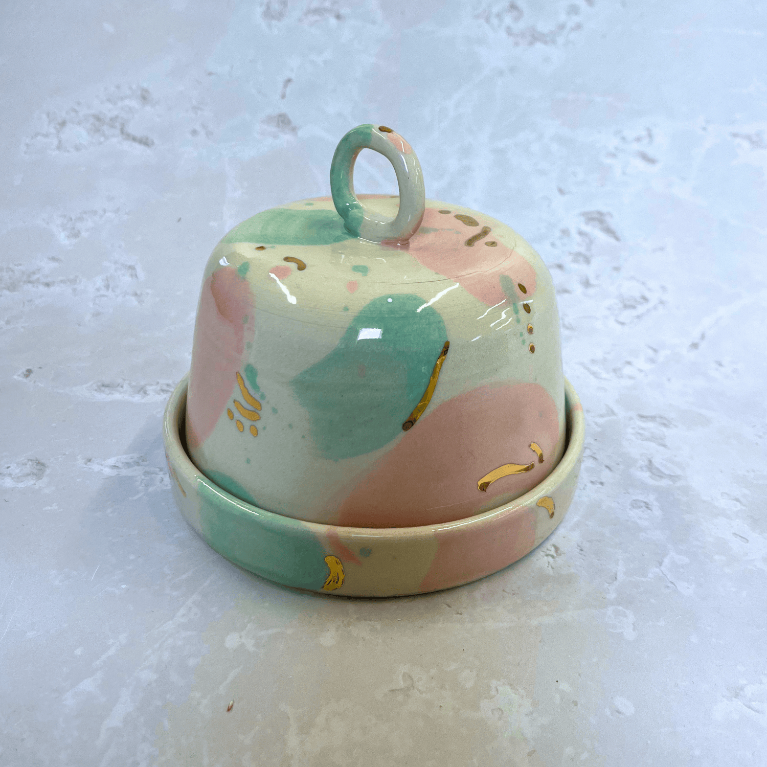 Ella Fletcher Designs Handmade Ceramic Butter Dish in Green & Pink Sea Glass, domed lid and dish with blobs of green and pink with gold speckle