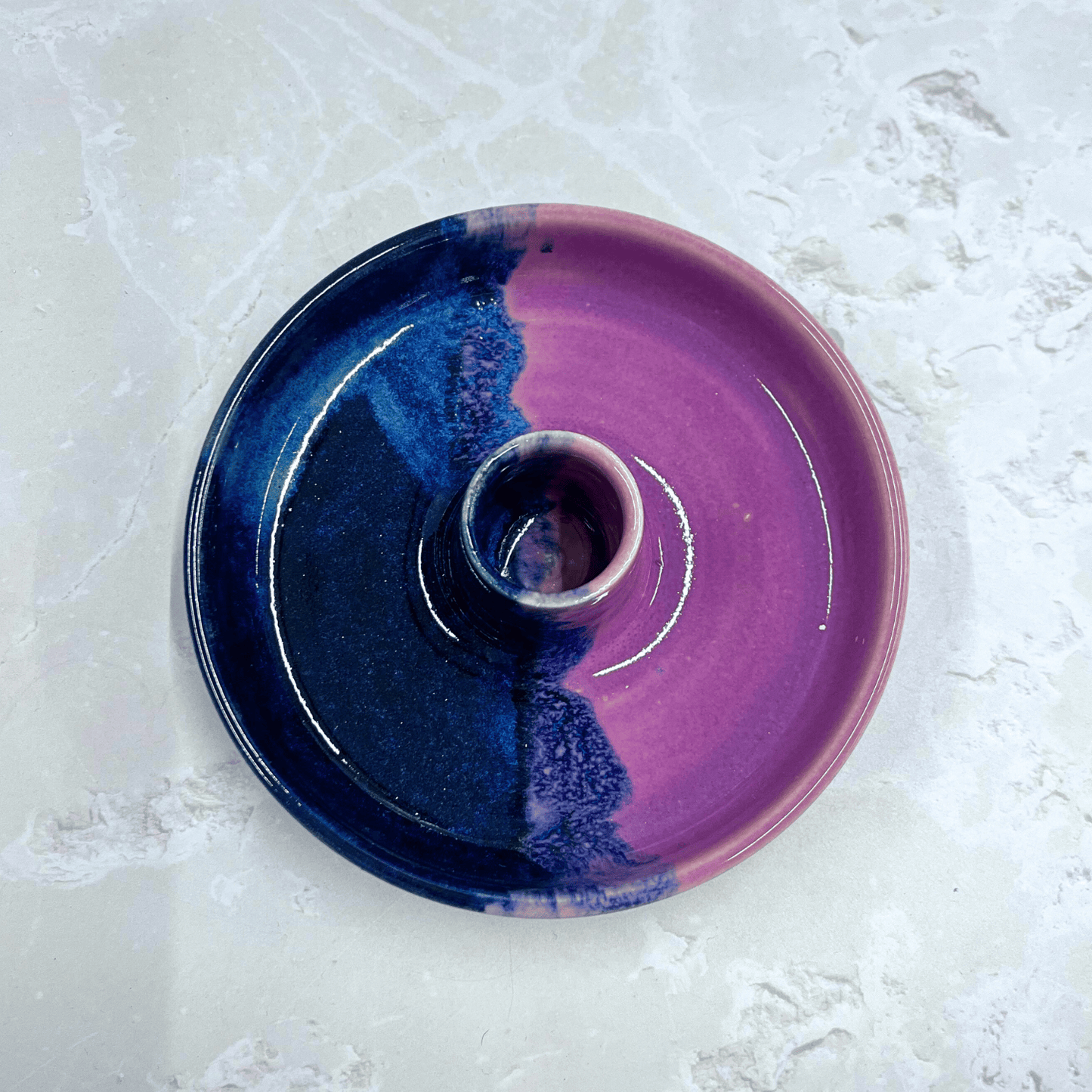 Ella Fletcher Designs Handmade Ceramic Candlestick holder in Pink Scottish Landscape design, circular candlestick holder with layered dark and light blues and pinks featured from above