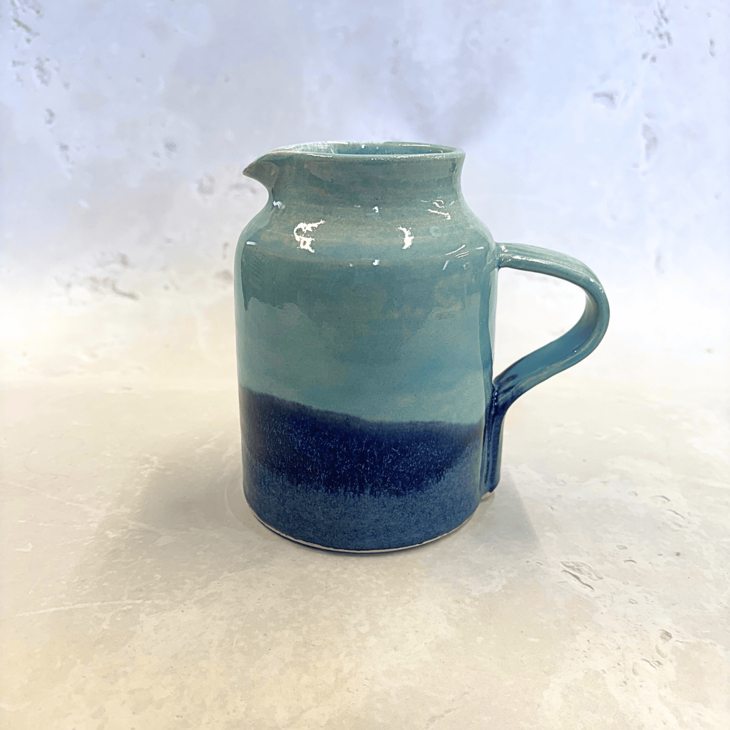 Ella Fletcher Designs Handmade UK Ceramic Jug in Blue Landscape, jug with layers of light and dark blues