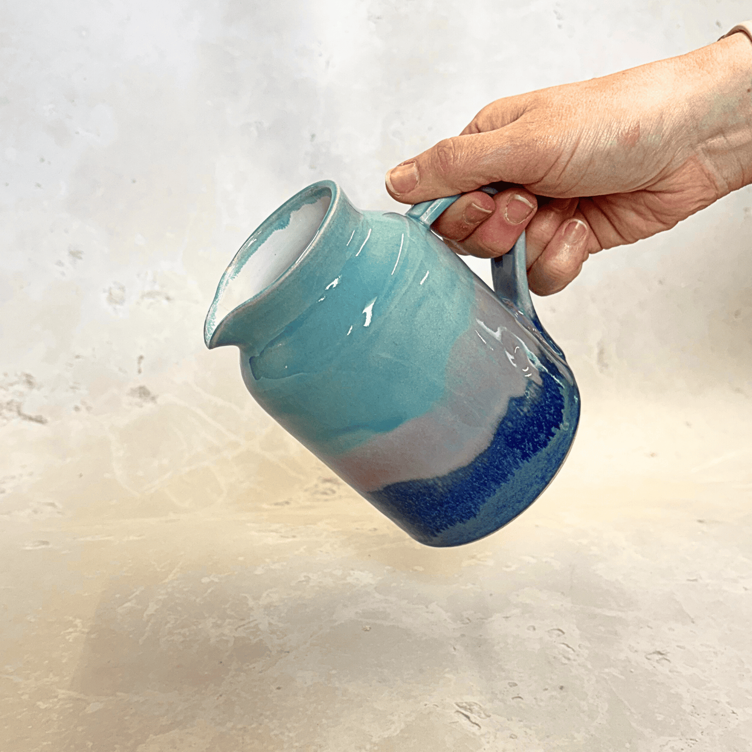 Ella Fletcher Designs Handmade Ceramic Jug in Scottish Sunrise Landscape, pottery jug with layers of pinks and blues