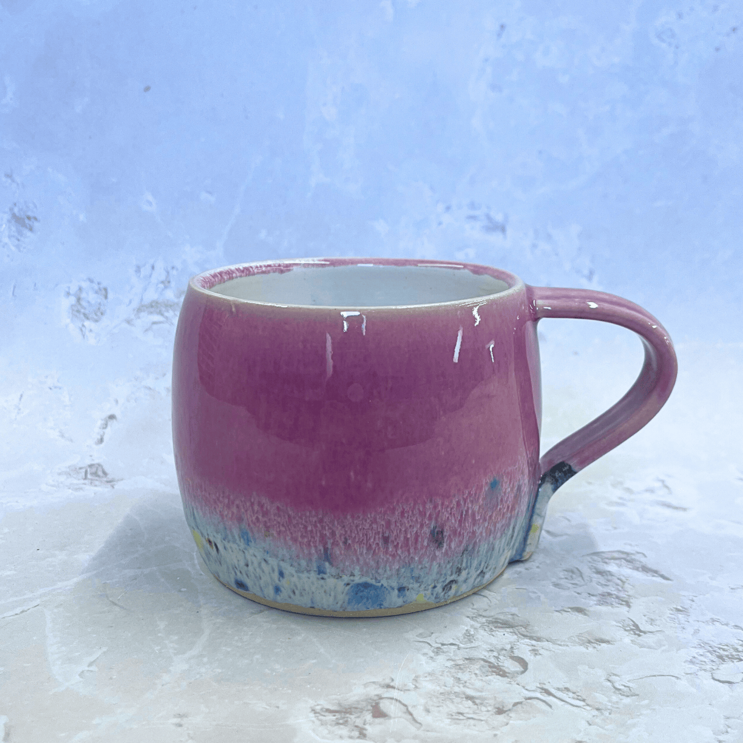 Ella Fletcher Designs Handmade Ceramics Round Large Mug in Pink Shoreline design, handmade mug with solid pink and multi-coloured speckles