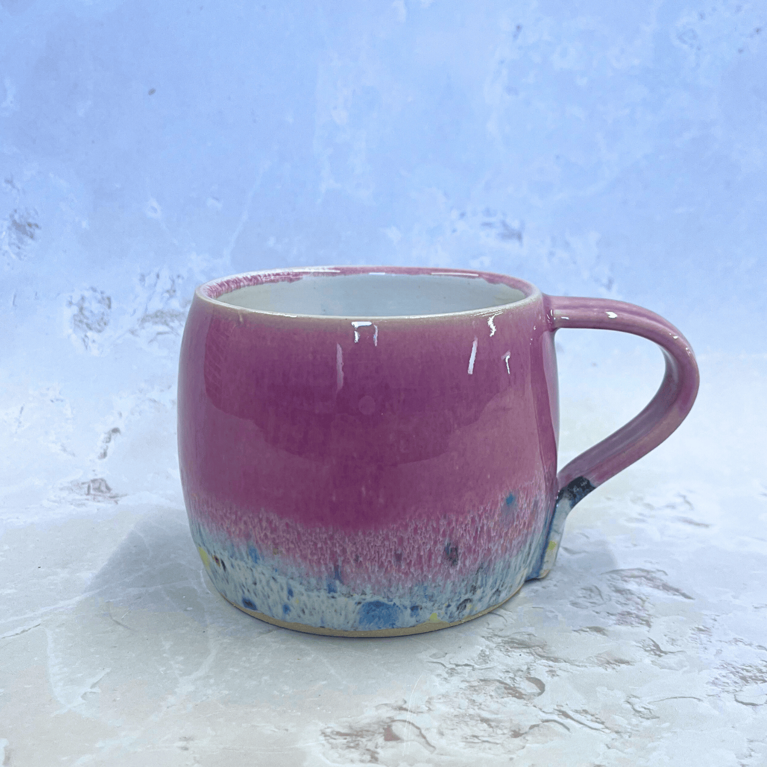 Ella Fletcher Designs Handmade Ceramics Round Large Mug in Pink Shoreline design, handmade mug with solid pink and multi-coloured speckles