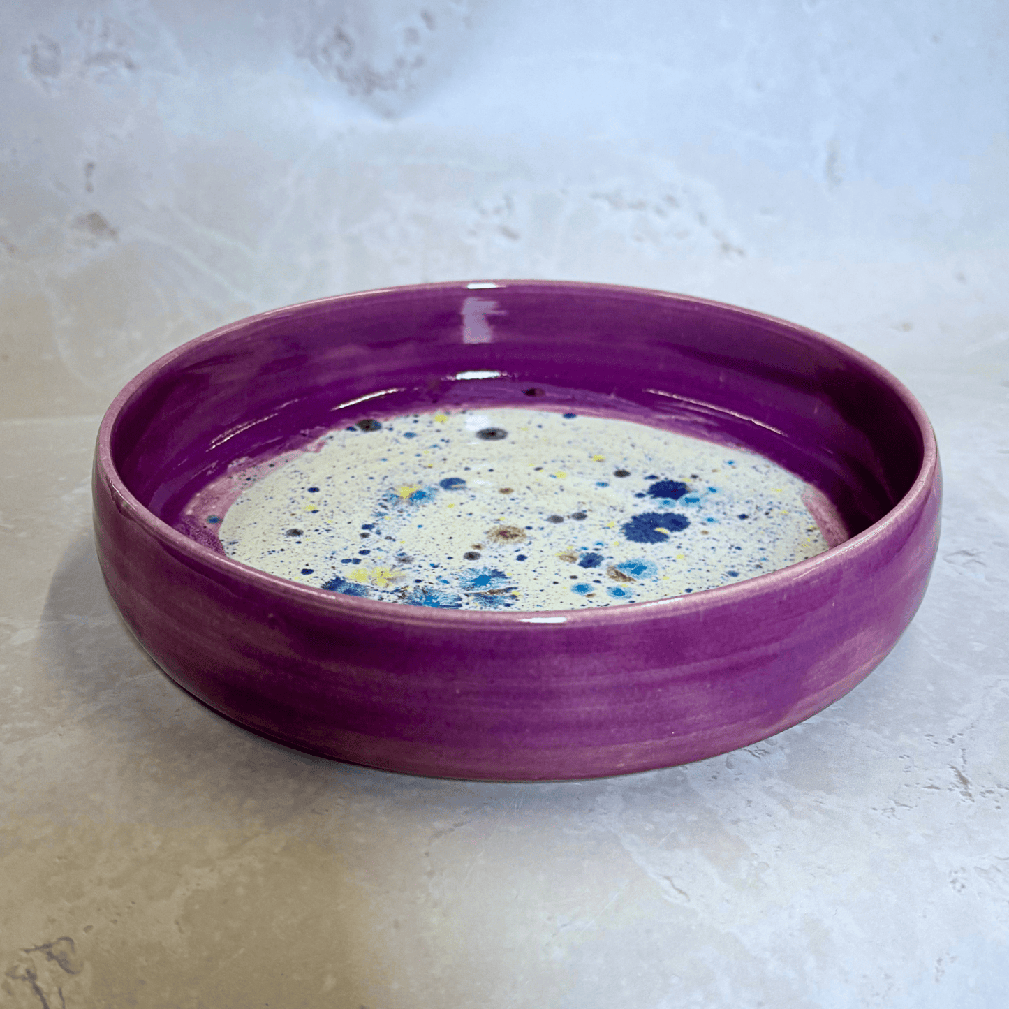 Ella Fletcher Designs Handmade UK Ceramic Pasta Bowl in Pink Shoreline, pink rimmed pasta bowl with multicoloured speckles inside