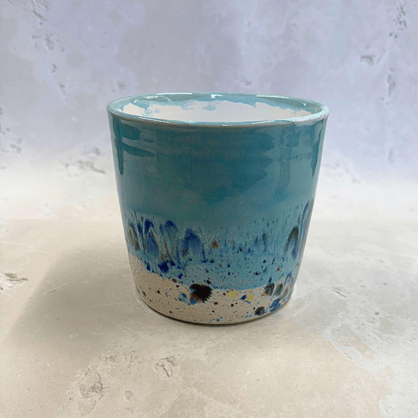 Ella Fletcher Designs Handmade Ceramics Pot in Green Shoreline, plant pot with blue and multicoloured speckles design