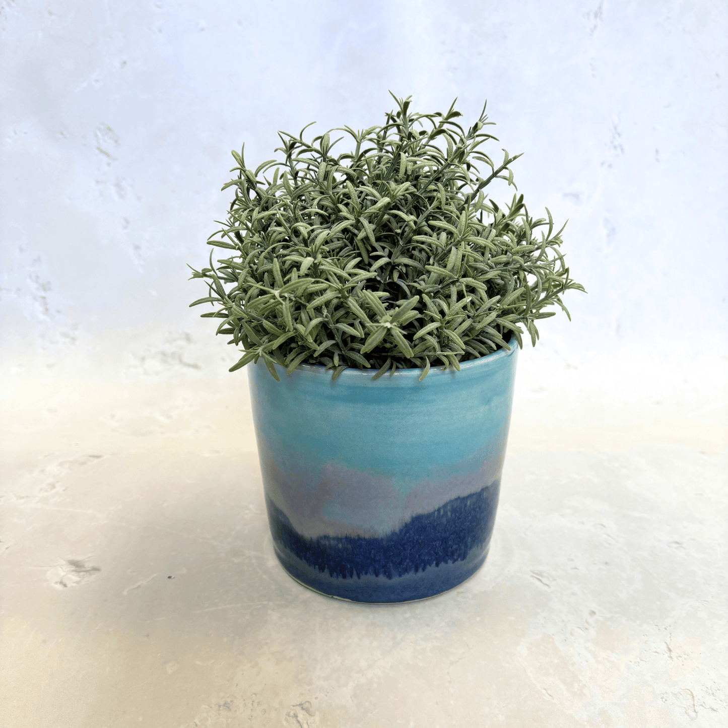 Ella Fletcher Designs Handmade Ceramic Pot in Scottish Sunrise Landscape, plant pot with layers of blues and pinks