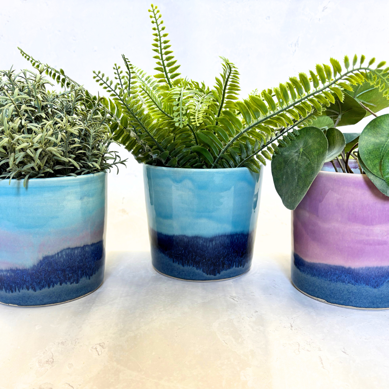 Ella Fletcher Designs Handmade Ceramic Pots in Landscape Design, three pots with landscape motifs