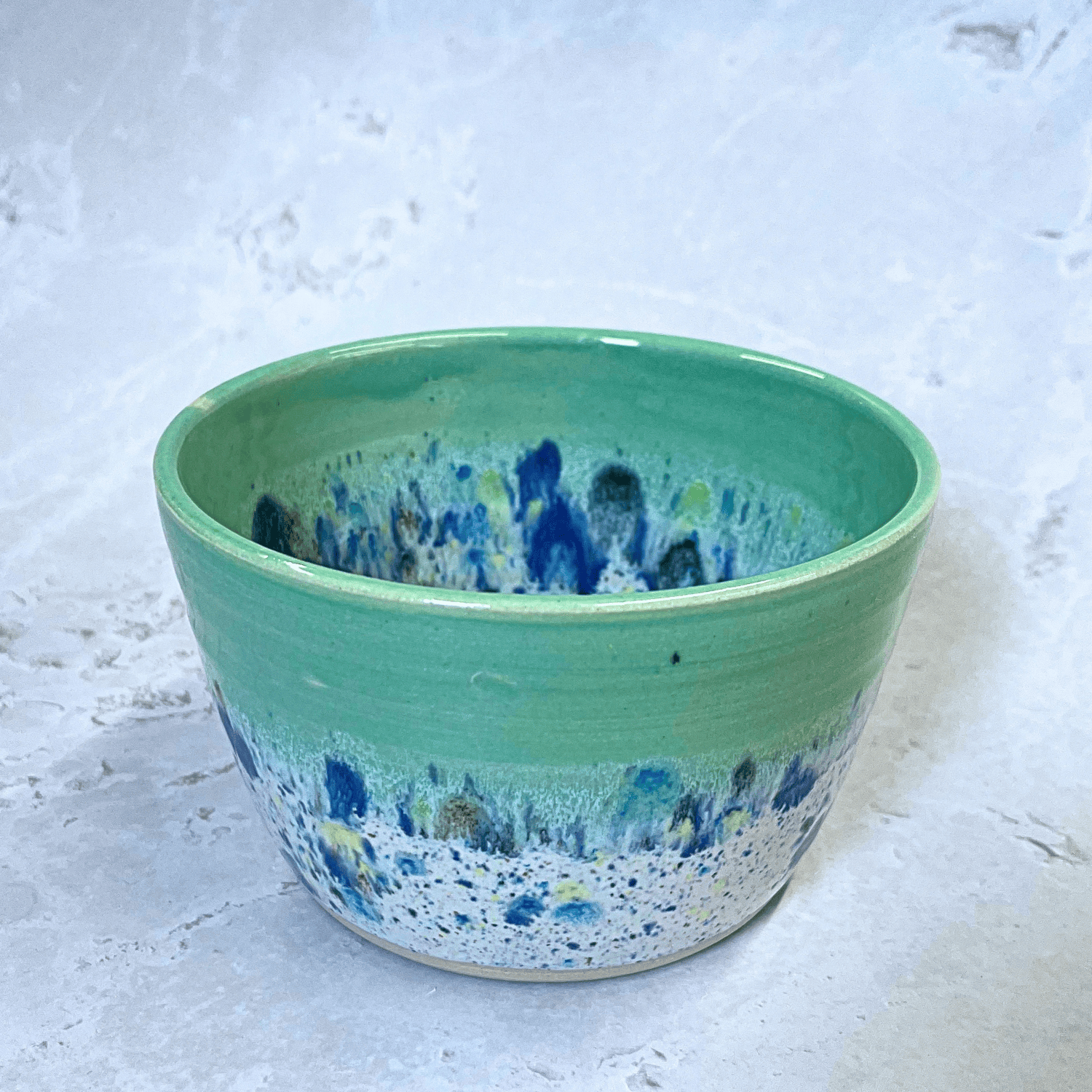 Ella Fletcher Designs Handmade Ceramics Small Bowl in Green Shoreline design, round green bowl with multicolour speckles