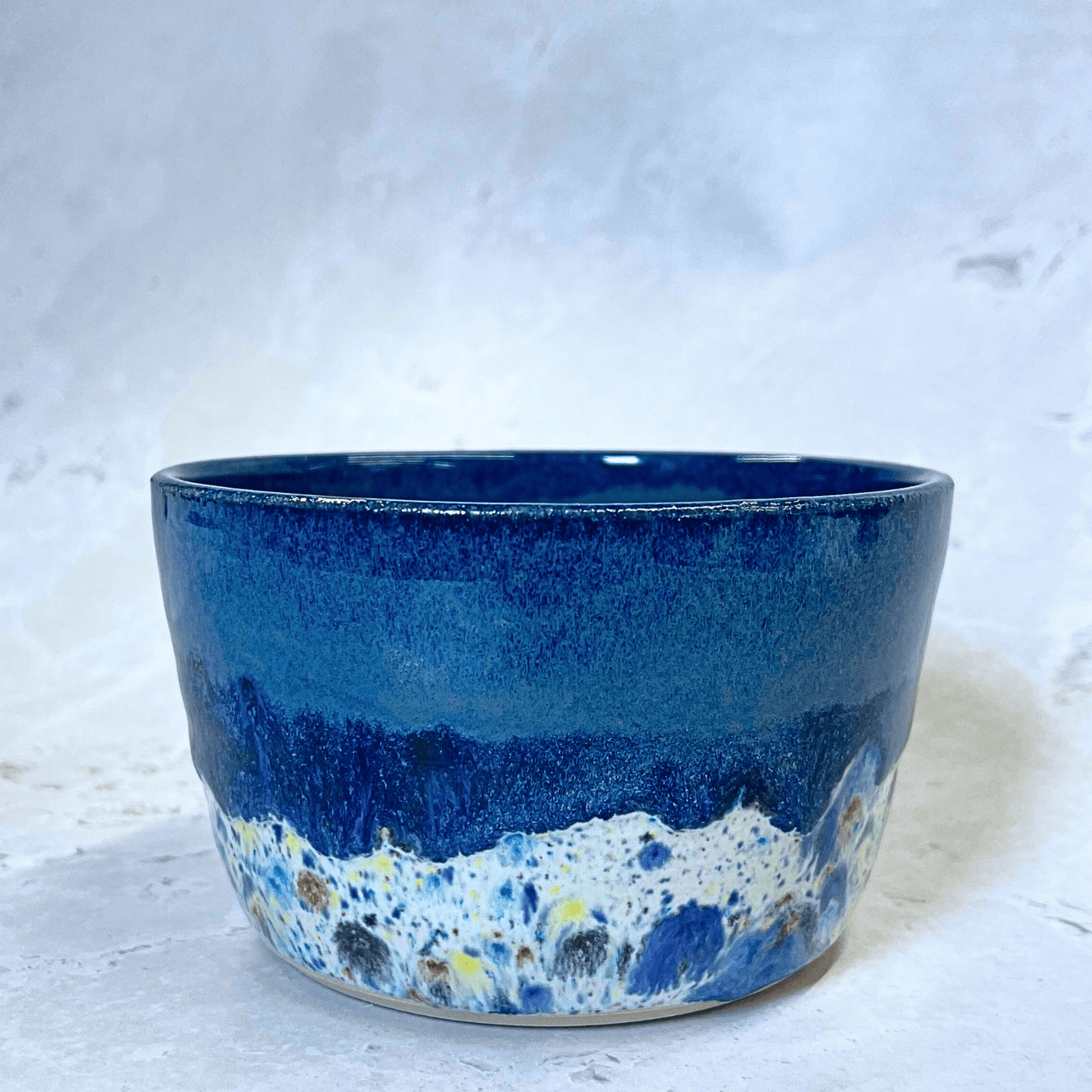 Ella Fletcher Designs Handmade Ceramics Small Bowl in Navy Shoreline design, round navy bowl with multicolour speckles