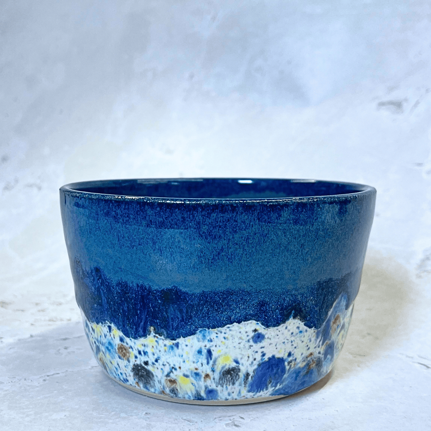 Ella Fletcher Designs Handmade Ceramics Small Bowl in Navy Shoreline design, round navy bowl with multicolour speckles