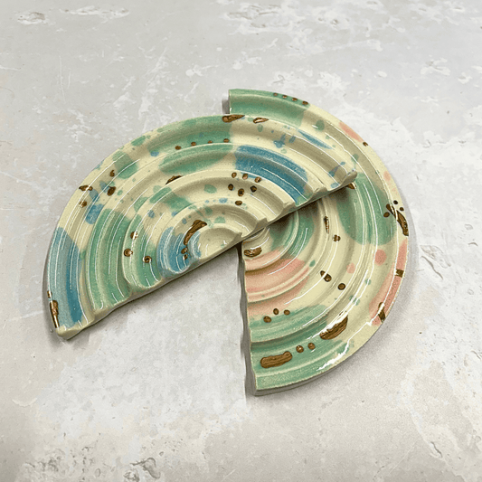 Ella Fletcher Designs Handmade Ceramics soap dish in Sea Glass design, semi-circle dish with ridges and splotches of pink, blue and green with gold