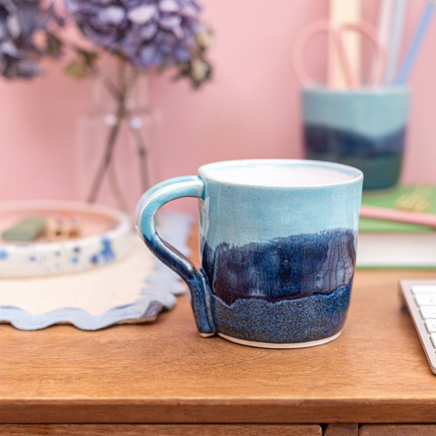 Ella Fletcher Designs Handmade Ceramics Standard Mug in Blue Scottish Landscape Design, layers of blues resembling the Scottish landscape