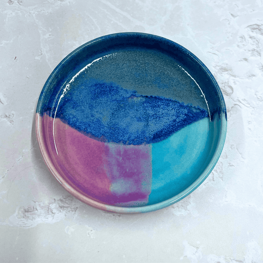 Ella Fletcher Designs Handmade Ceramic Trinket Dish in Scottish Sunrise Landscape, small round dish with layers of blues and pinks