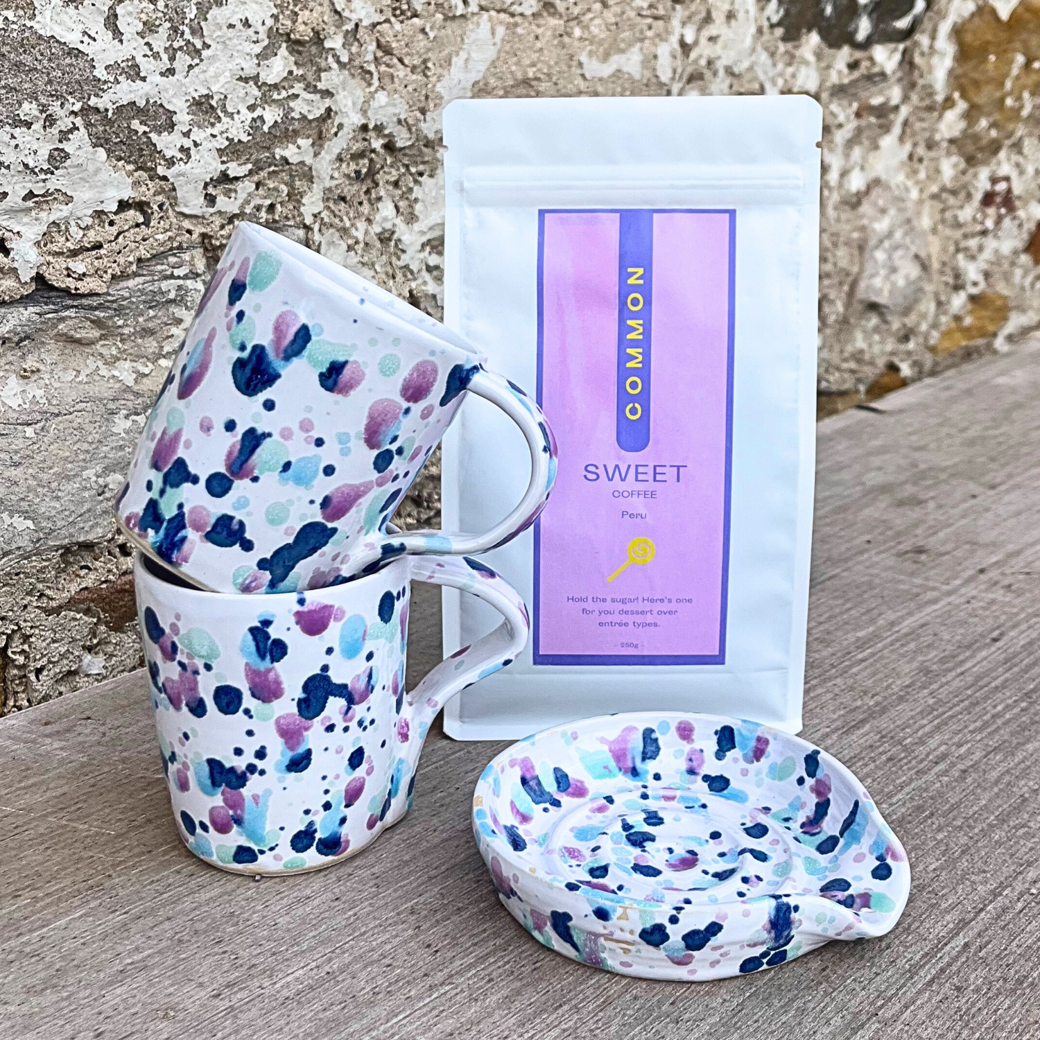 Ella Fletcher Designs Handmade Ceramic coffee gift set in sweetpea design, two mugs, spoon rest and coffee