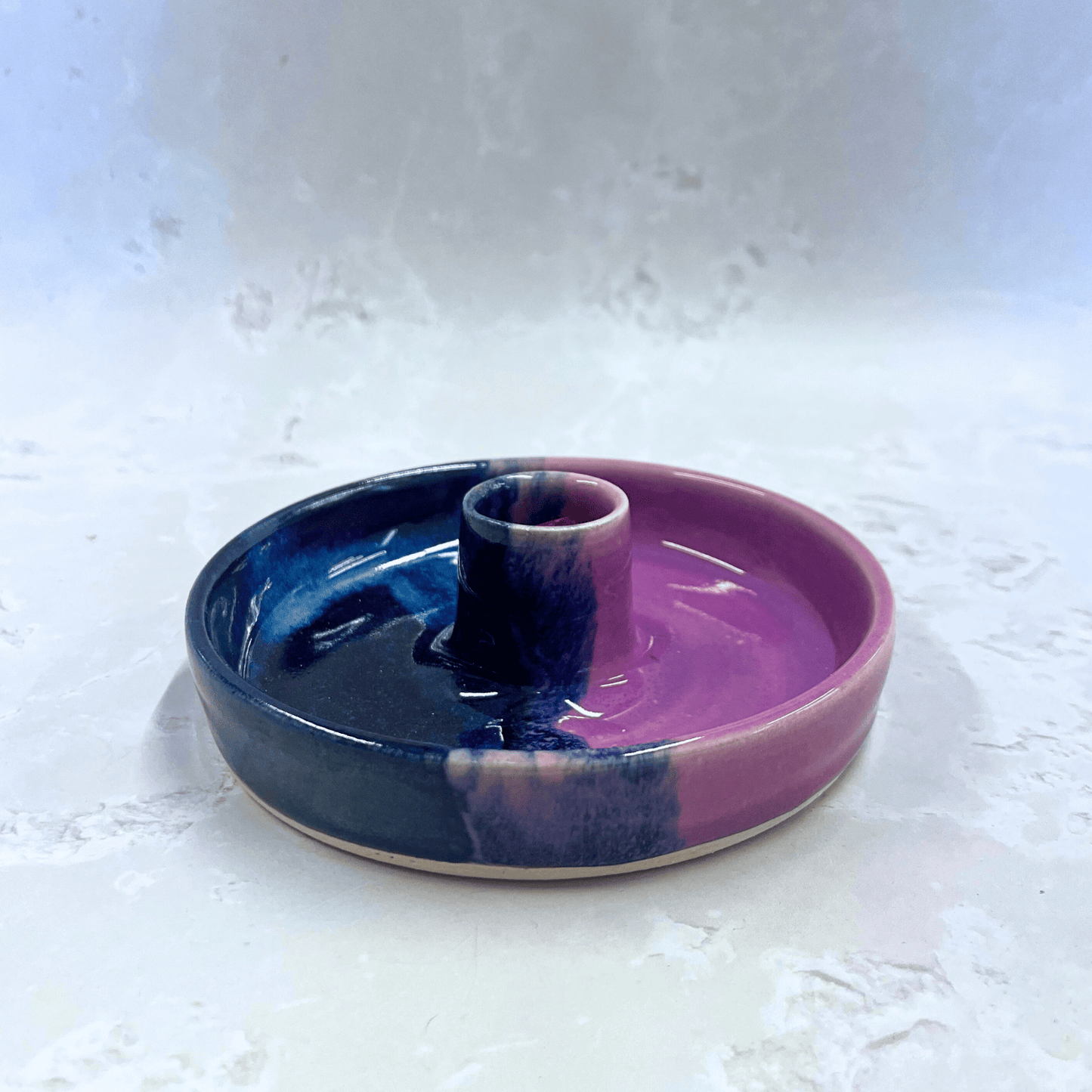 Ella Fletcher Designs Handmade Ceramic Candlestick holder in Pink Scottish Landscape design, circular candlestick holder with layered dark and light blues and pinks