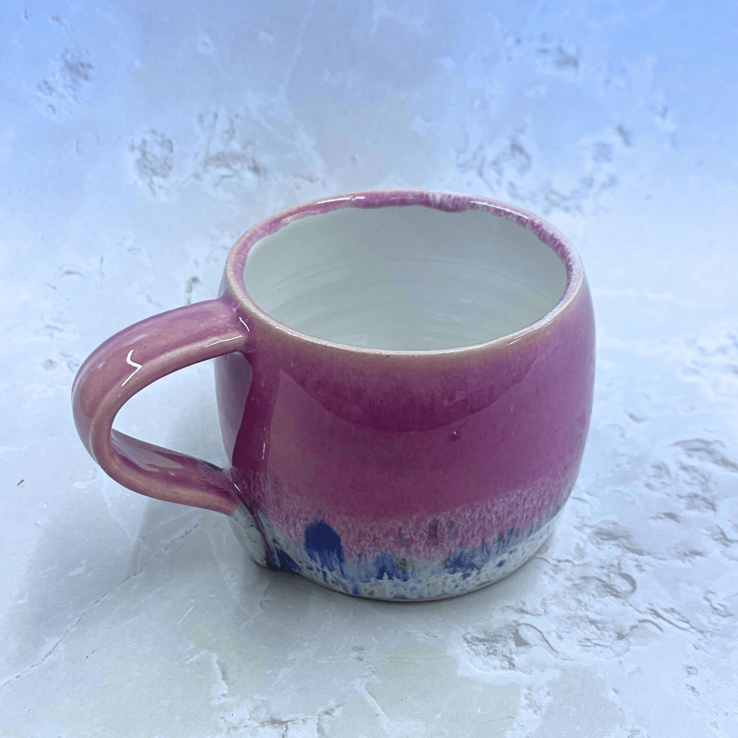 Ella Fletcher Designs Handmade Pottery Large Round Mug in Pink Shoreline with pink and multi-coloured speckled design