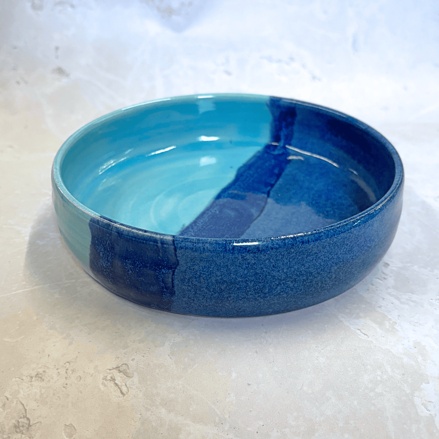 Ella Fletcher Designs Handmade Ceramic Pasta Bowl in Blue Landscape - pasta bowl with layers of light and dark blues, showcasing depth of the bowl
