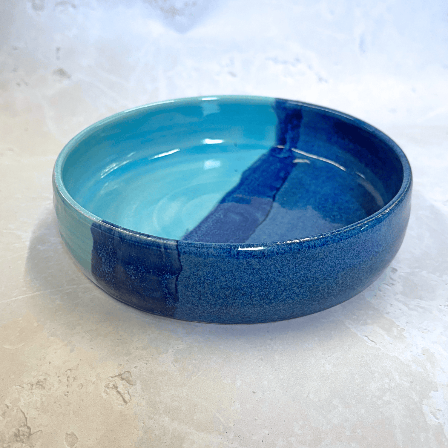 Ella Fletcher Designs Handmade Ceramic Pasta Bowl in Blue Landscape - pasta bowl with layers of light and dark blues, showcasing depth of the bowl