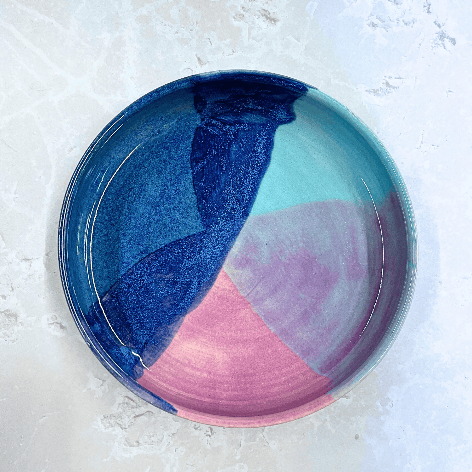 Ella Fletcher Designs Handmade Ceramic Pasta Bowl in Scottish Sunrise Landscape Design - pasta bowl with layers of blues and pinks resembling a Scottish sunrise
