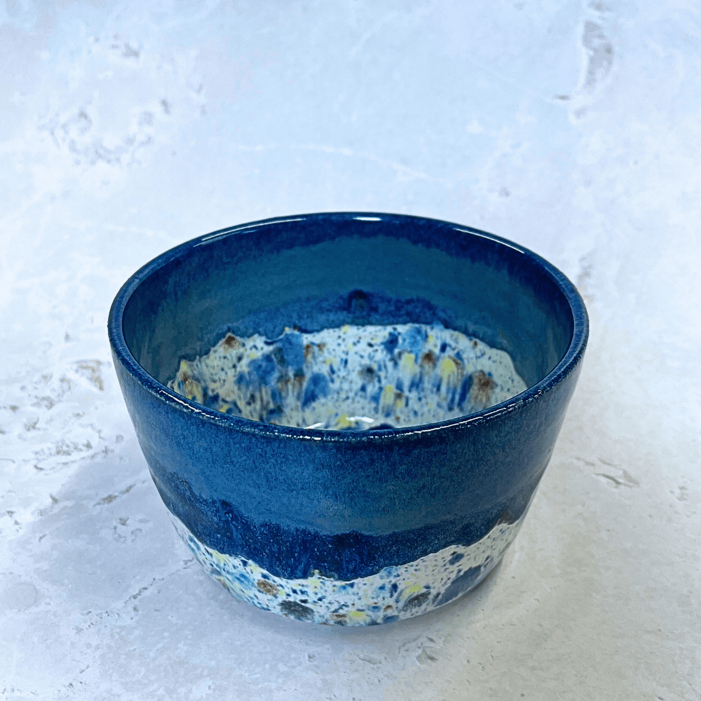 Ella Fletcher Designs UK Handmade Ceramic Small Bowl in Navy Shoreline design, round navy bowl with multicolour speckles