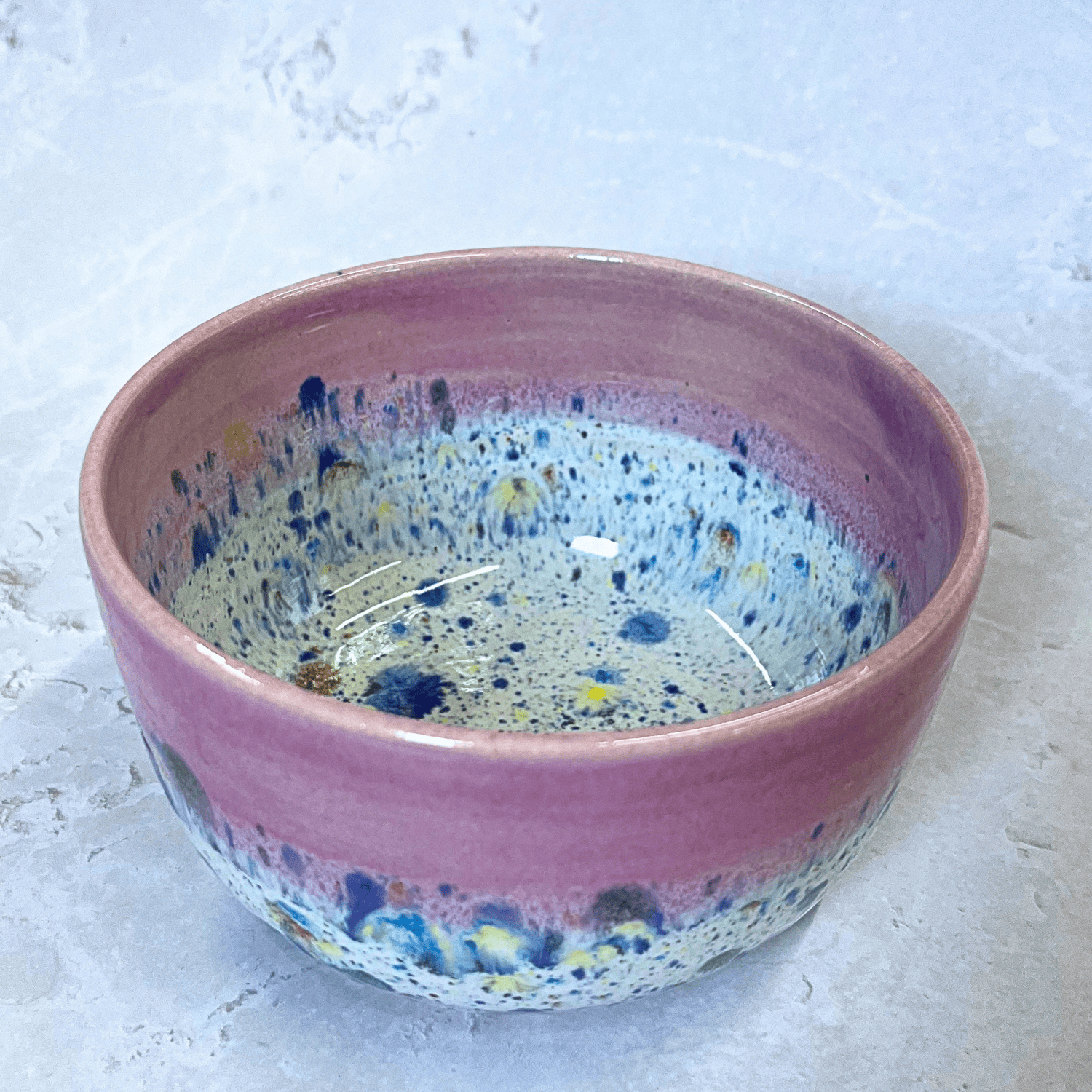 Ella Fletcher Designs UK Handmade Ceramic Small Bowl in Pink Shoreline design, round bowl with pink and multicolour speckles