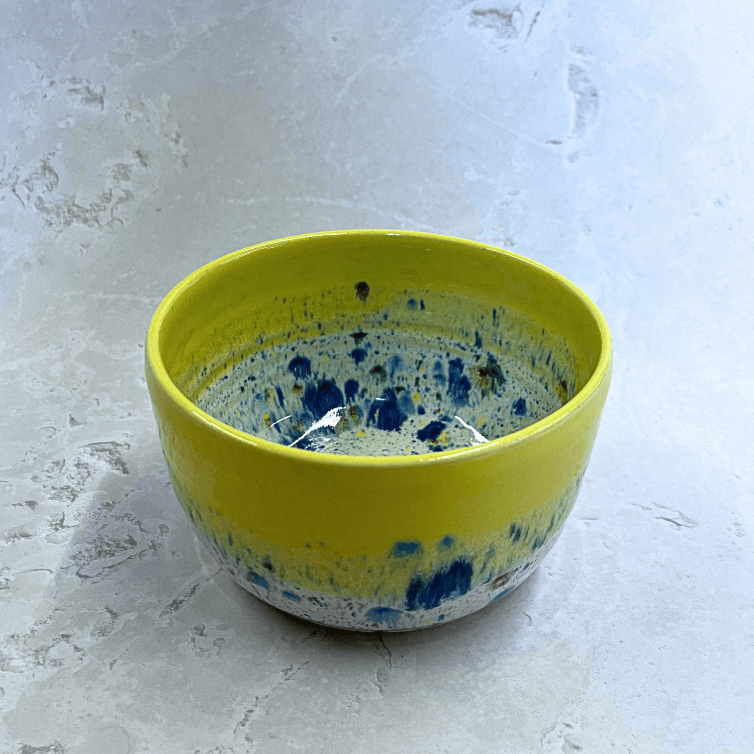 Ella Fletcher Designs UK Handmade Ceramic Small Bowl in Yellow Shoreline design, round bowl in yellow with multicolour speckles