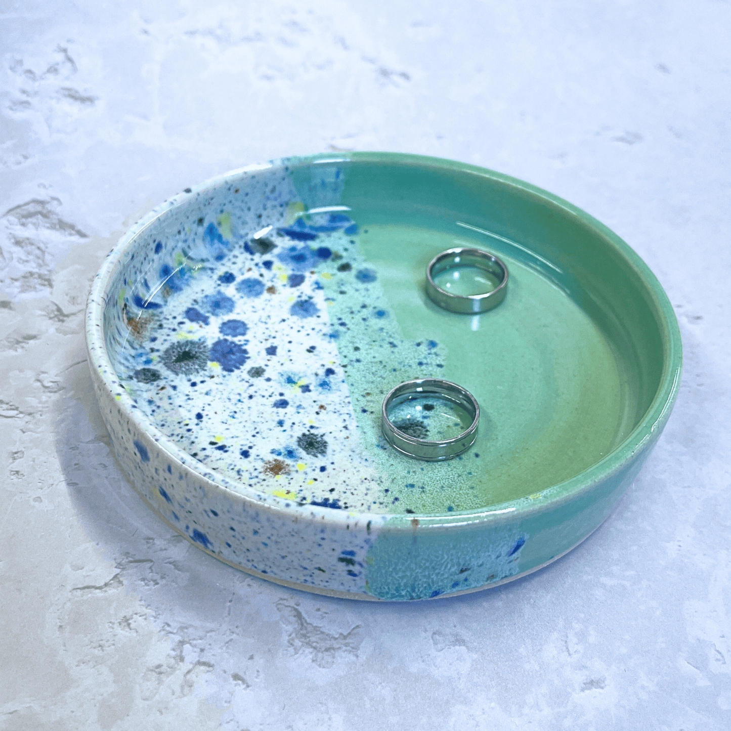 Ella Fletcher Designs Handmade Ceramics Trinket Dish in Green Shoreline Design, small round green and multicolour speckled dish with rings inside