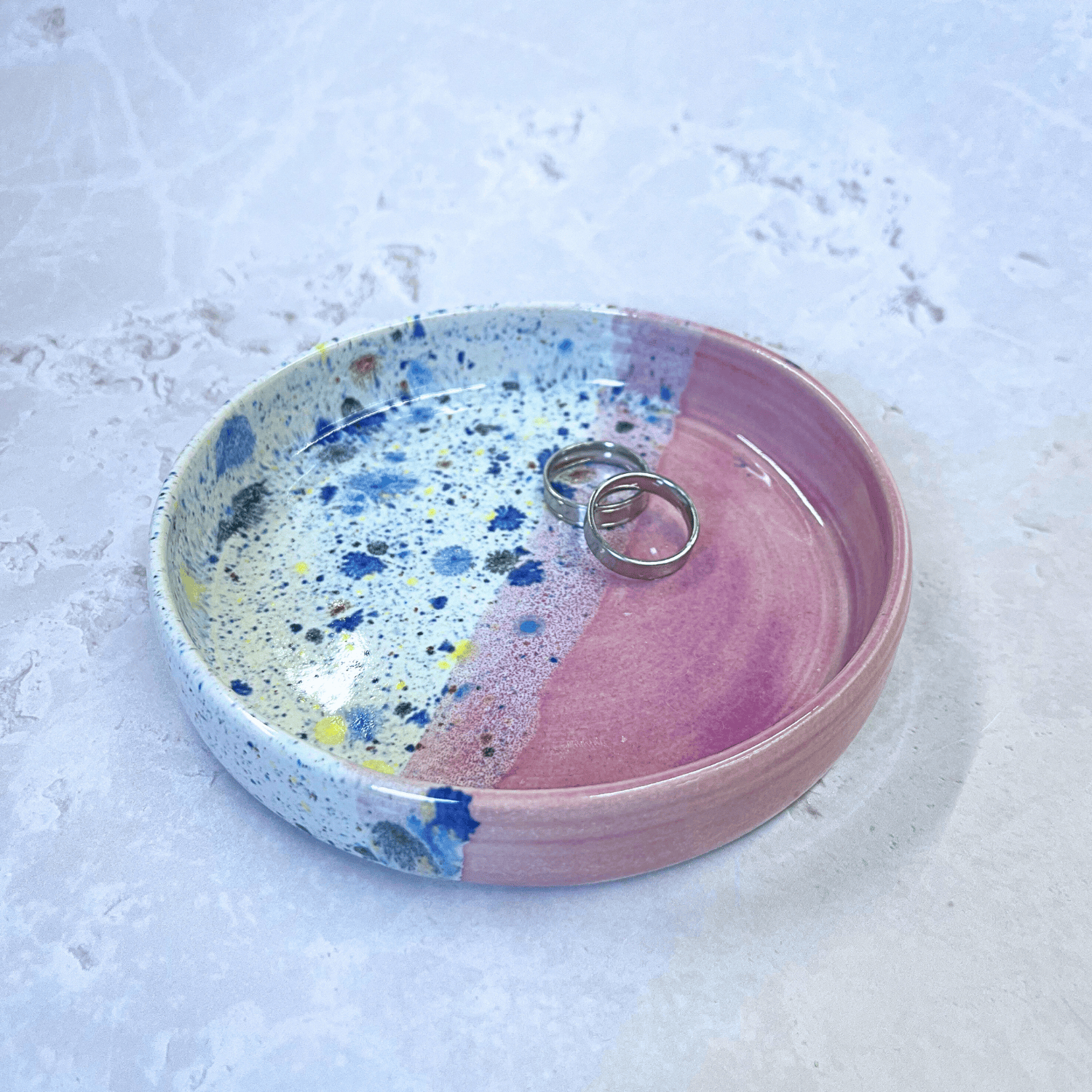 Ella Fletcher Designs Handmade Ceramics Trinket Dish in Pink Shoreline Design, small round dish with pink and multicolour speckles featured with rings inside