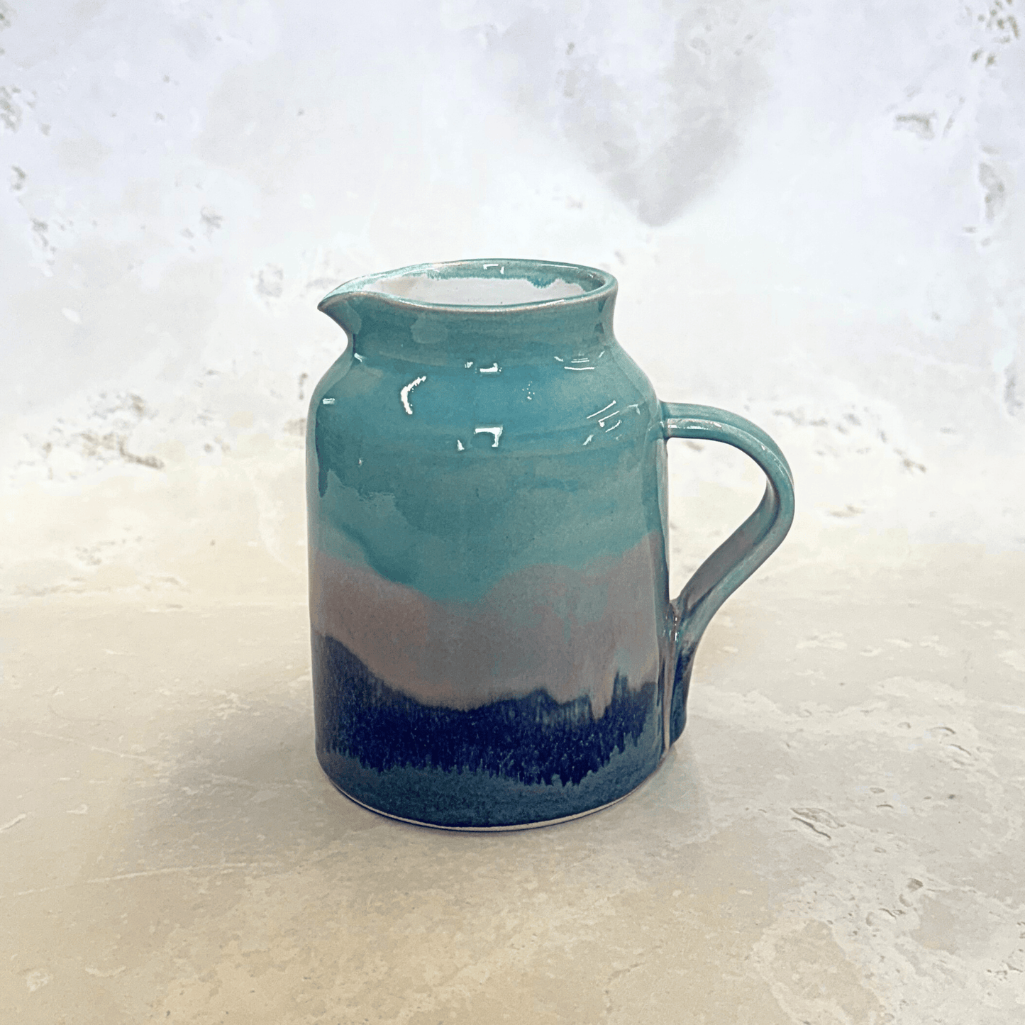 Ella Fletcher Designs Handmade UK Ceramic Jug in Scottish Sunrise Landscape, jug with blues and pink layers