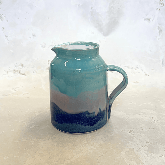 Ella Fletcher Designs Handmade UK Ceramic Jug in Scottish Sunrise Landscape, jug with blues and pink layers
