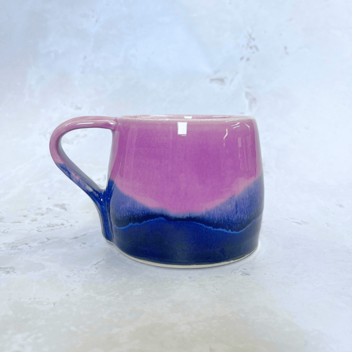 Ella Fletcher Designs Handmade Ceramic Large Round Mug in Pink Scottish Landscape Design, layers of blues and pinks inspired by the Scottish Landscape
