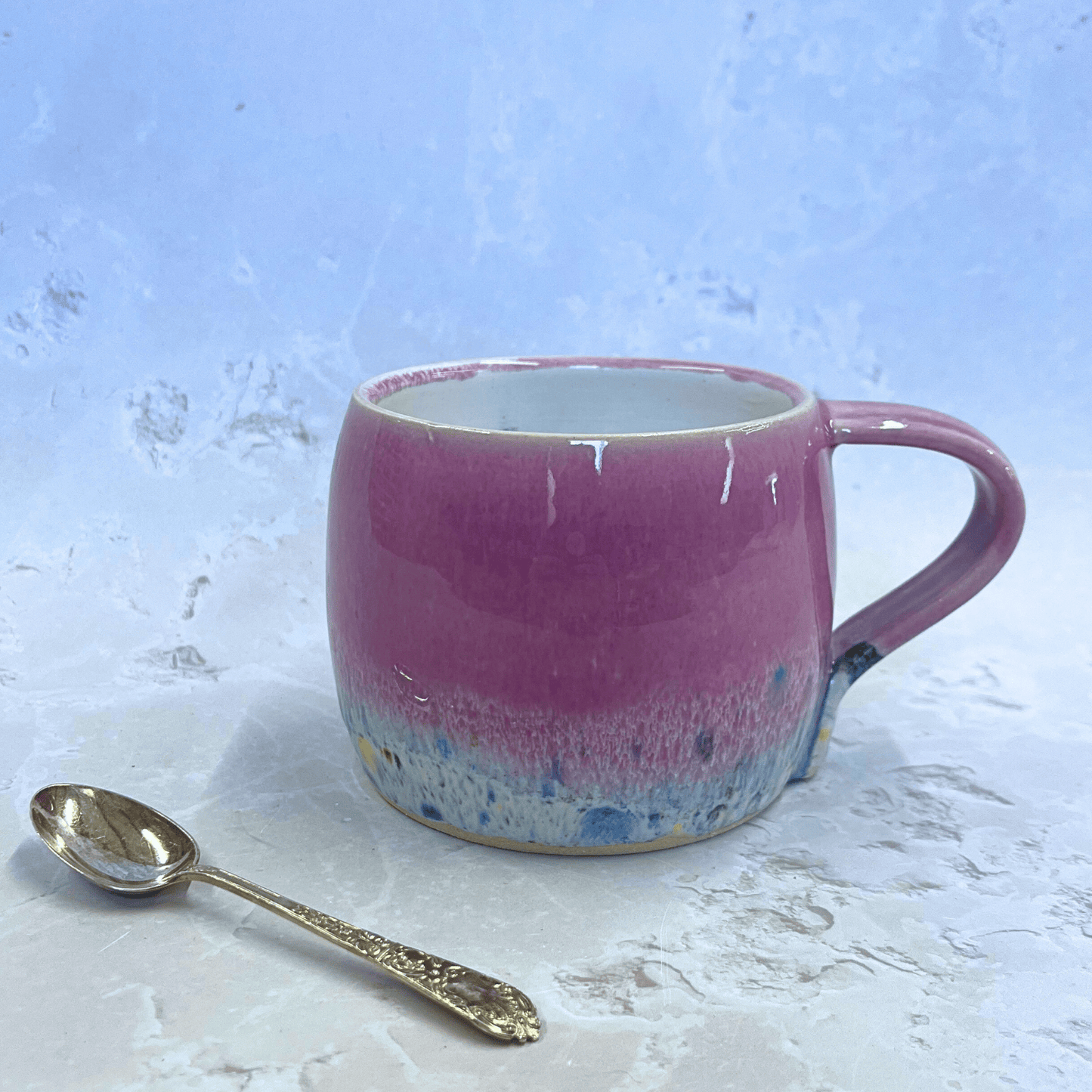 Ella Fletcher Designs Handmade Ceramics Round Large Mug in Pink Shoreline with pink and multi-coloured speckled design inspired by the Scottish shoreline