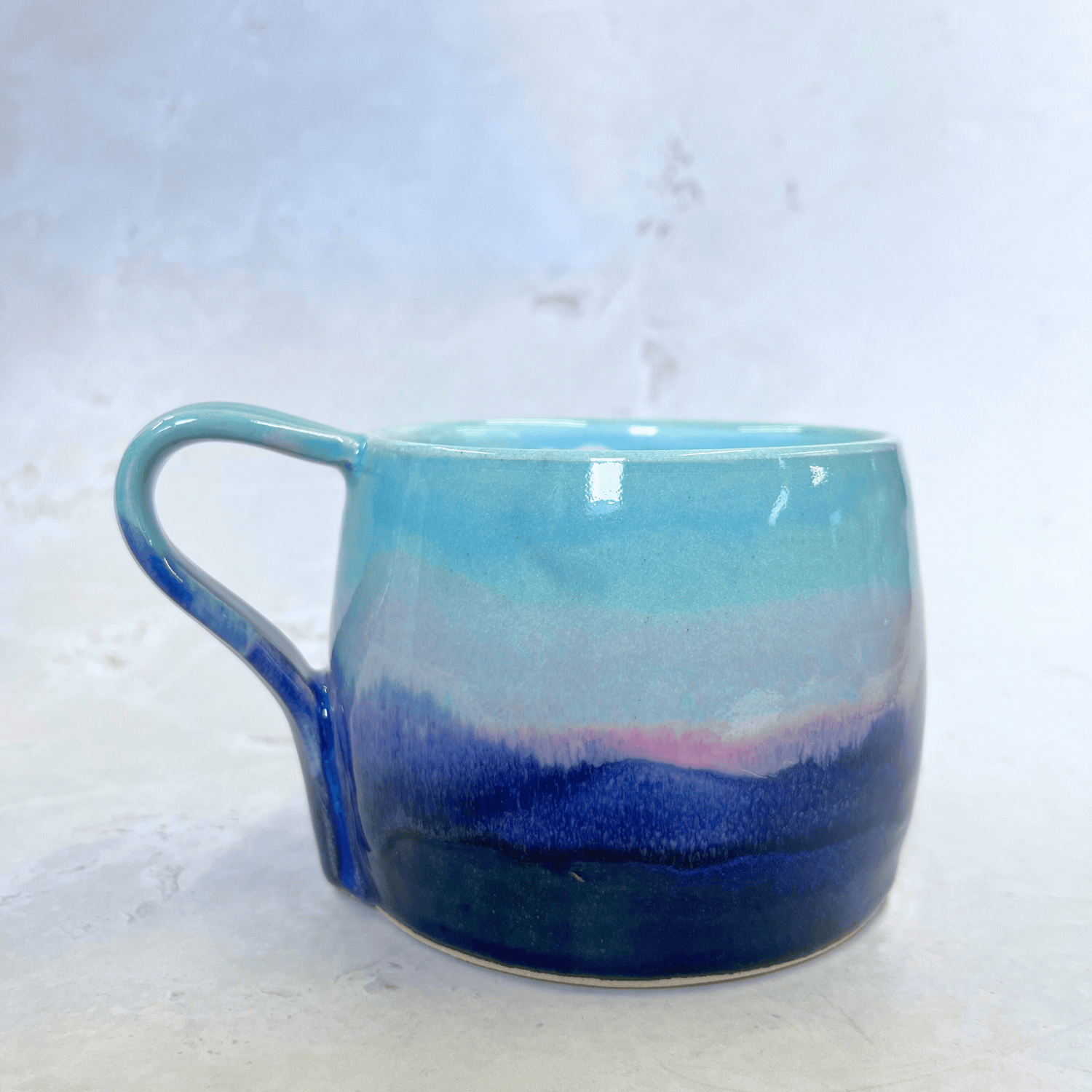 Ella Fletcher Designs Handmade Ceramic Large Round Mug in Scottish  Sunrise Landscape Design, layers of blues and pinks inspired by the Scottish Sunrise and landscape