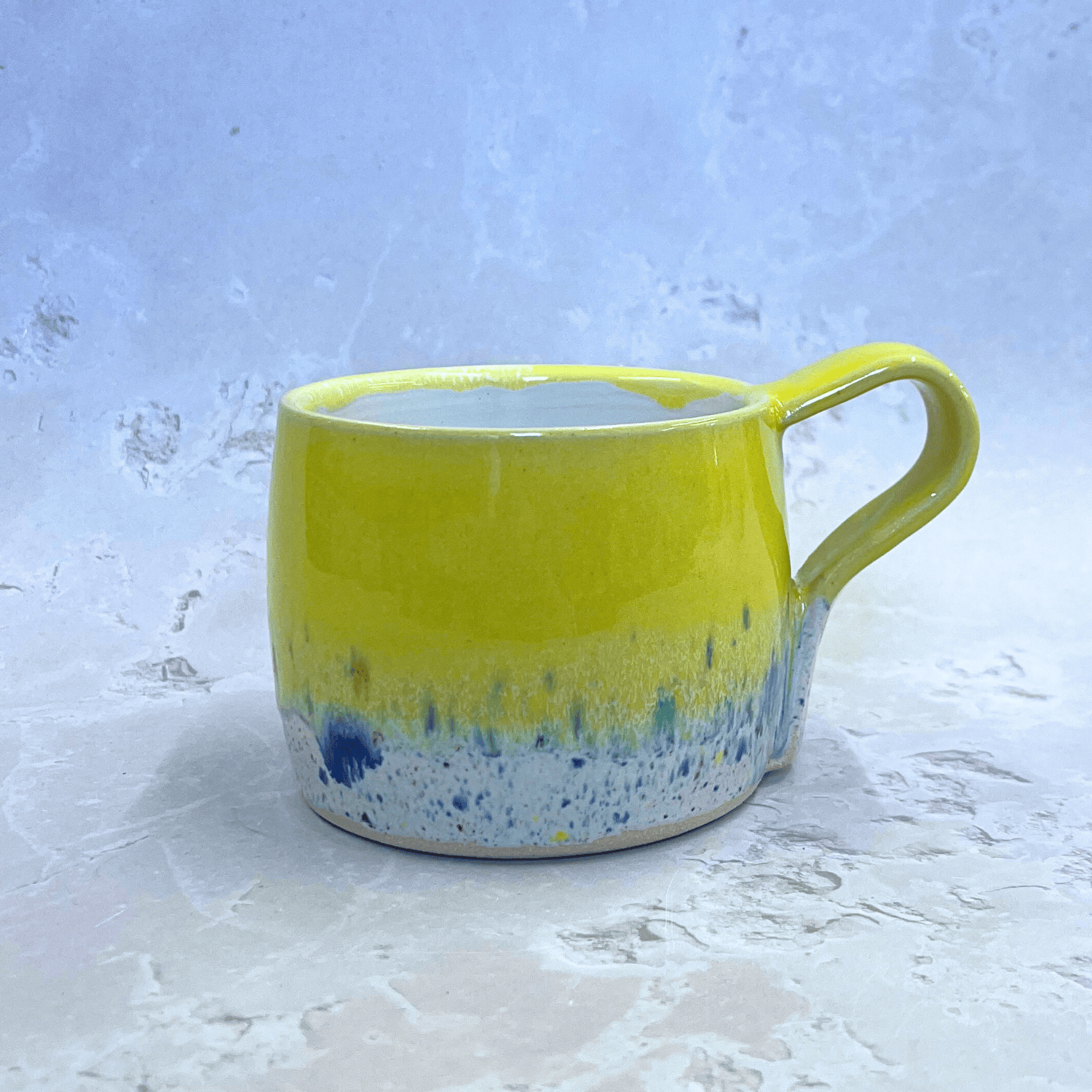Ella Fletcher Designs Handmade Ceramics Round Large Mug in Pink Shoreline, handmade yellow and multi-coloured mug with speckled design inspired by the Scottish shoreline