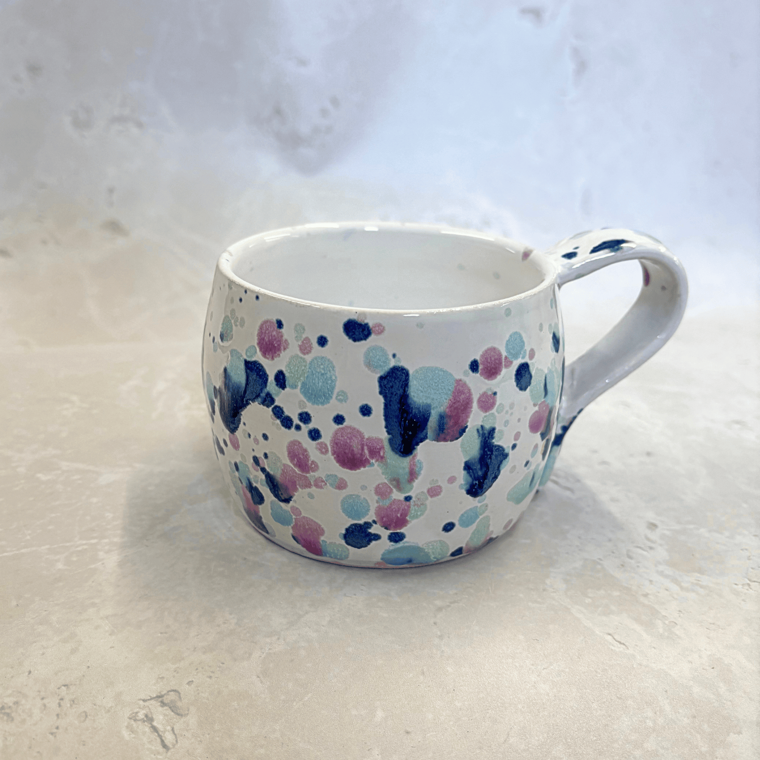 Ella Fletcher Designs Handmade Ceramic Large Round Mug in Sweepea design, round mug featuring splashes of blues, pinks and green
